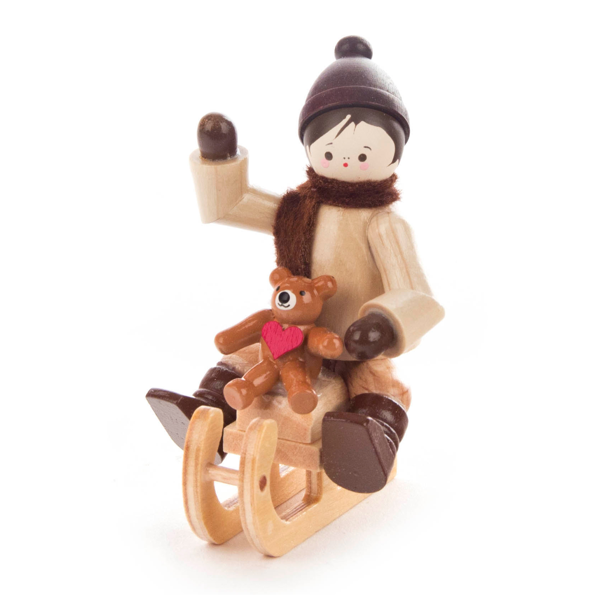 Winterkind mit Teddy auf Schlitten Winterkind mit Teddy auf Schlitten